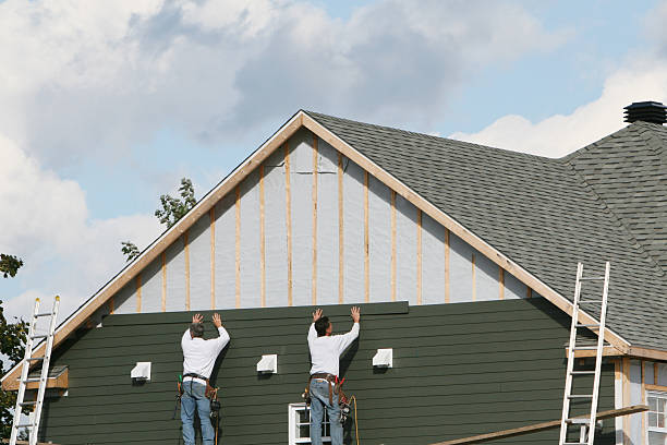 Professional Siding technician working in Polk, PA